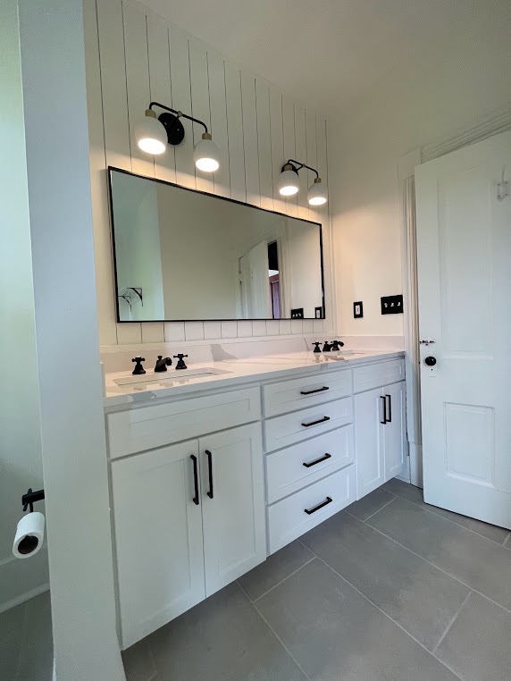 Luxury bathroom remodel with freestanding tub and glass shower